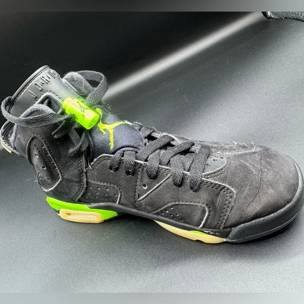Jordan Black and Green Sneakers with Air Unit and Perforated Panels